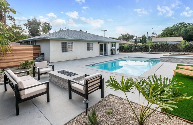 Coastal modern home 10 min from the beach with a stunning pool and spa!