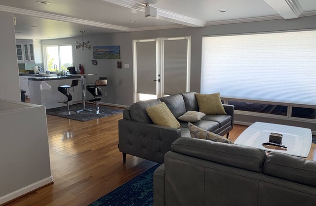 Coastal view home with privacy, hot tub. Serenity not too far from Civilization!