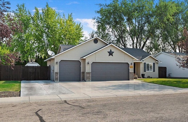 Coffee in the Sunroom or BBQ on the Deck at this 4 Bed 2 Bath Home