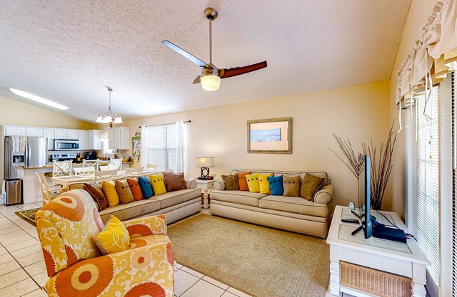 Colorful home near the beach with 2 pools, bikes, beach gear, W/D, & AC