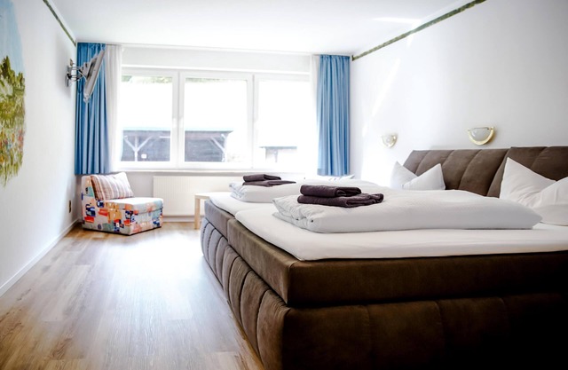 Komfortables und vielseitiges Zimmer –Perfekt für Erholung, Arbeit und Austausch