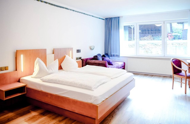 Komfortables und vielseitiges Zimmer –Perfekt für Erholung, Arbeit und Austausch
