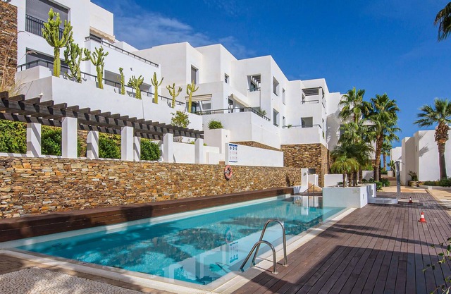 Comfortable apartment with shared pool and sea view.