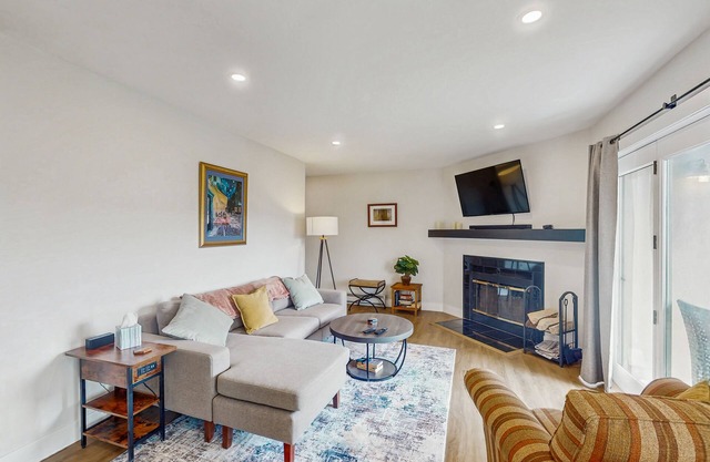 Completely remodeled, ground-floor condo with mountain views, patio, fireplace,