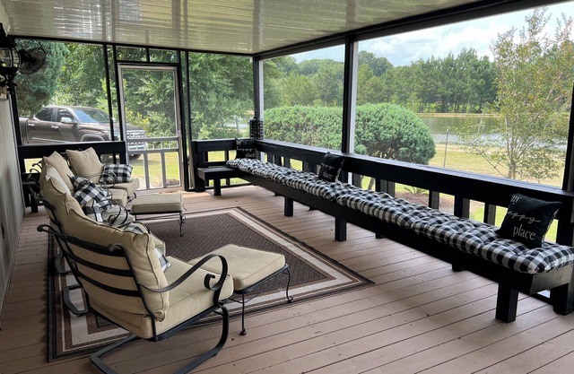 Completely renovated mobile home sitting own a pond.
