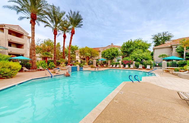 Condo with on-site pool, clubhouse, movie theater, & pedestrian paths