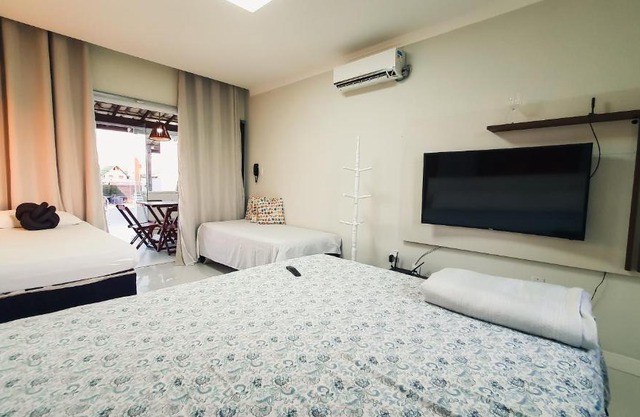 Confortável casa em Arembepe,100 metros da Praia com Churrasqueira Piscina e Wi-fi