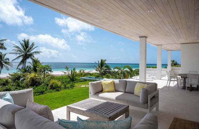 Contemporary Beachfront Escape with Private Pool on Windermere's World-Famous Pink Sand Beach