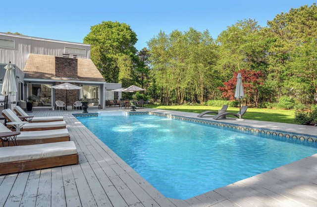Contemporary home close to beaches with private pool, open floorplan, and...