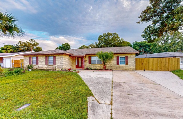 Conveniently located home with private pool, patio, foosball, & private W/D