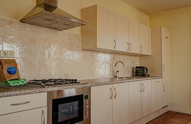 Cosy apartment for 4 people with WIFI, TV, terrace, pets allowed and parking