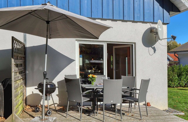 Gemütliche Wohnung in einem Ferienhaus für 4 Personen mit W-LAN, TV, Terrasse und Parkplatz