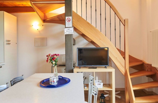 Wohnung in einem Ferienhaus mit W-LAN, Klimaanlage, TV, Innenhof, Haustiere erlaubt, Parkplatz