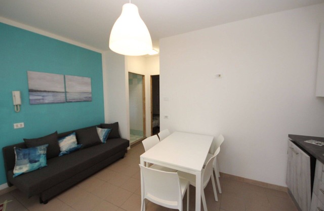 Wohnung in einem Ferienhaus mit Klimaanlage, W-LAN, TV, Terrasse, Haustiere erlaubt, Parkplatz