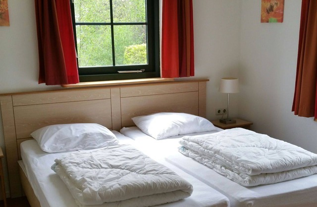 Herrliche Wohnung in einem Ferienhaus mit W-LAN, TV, Haustiere erlaubt und Parkplatz