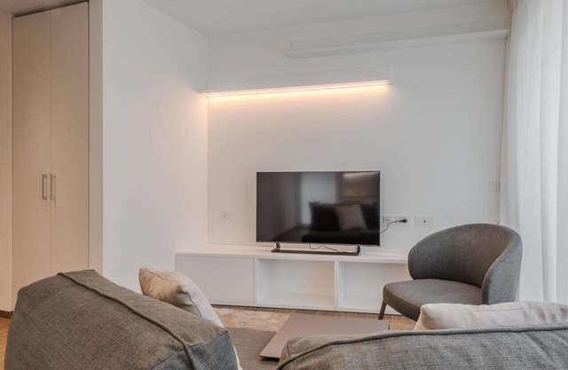 Schöne Wohnung in einem Ferienhaus für 6 Personen mit W-LAN, TV, Balkon und Parkplatz