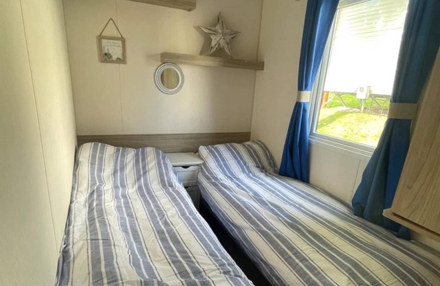 Cosy caravan for great holidays on the Jurassic coast. Sleeps 8 and dog friendly