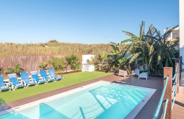 Cosy Villa with heatable pool at walking distance from the beach