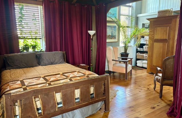 Country church converted into comfy, elegant escape — outdoor entertainment area