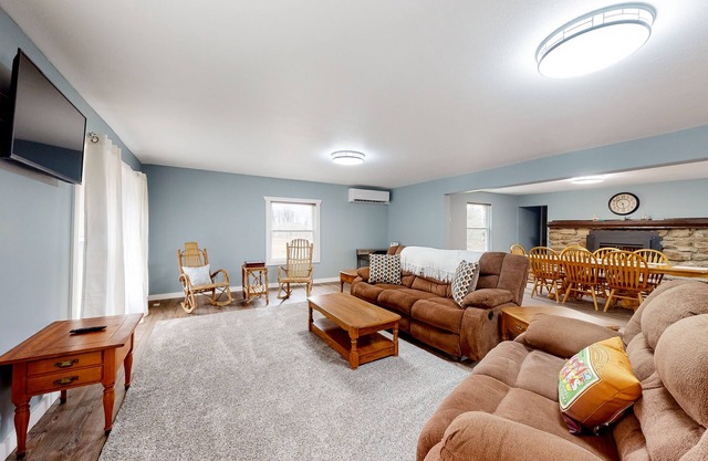 Country escape on 43 acres with boat launch access, a firepit, grill, & W/D