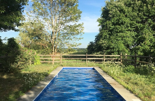 Country home in a park-like setting, perfect for private enjoyment.