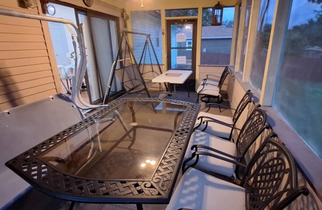 Country like house with a quiet outdoor dinning sunroom