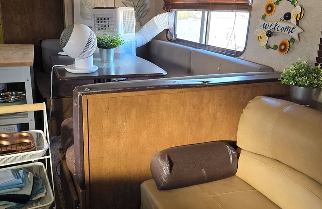 Cozy 1 Bedroom RV and sofa sleeper that can sleep up to 3 persons comfortably