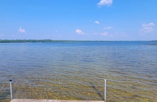 Cozy 1950’s lake front cabin with beautiful sunsets!