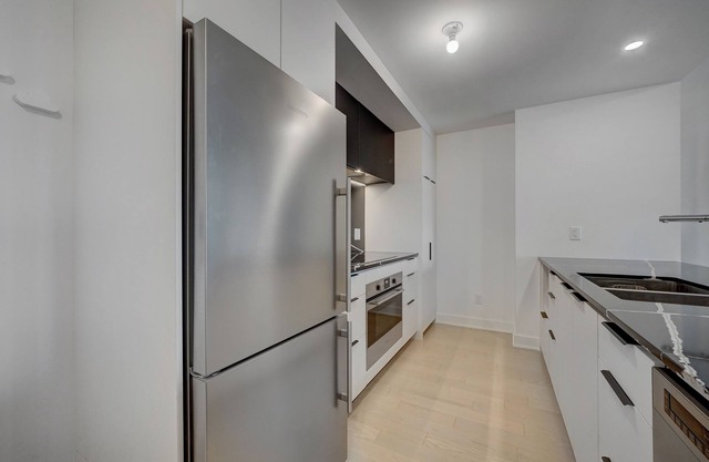 Cozy 2-bedroom fully furnished condo available for rent in the heart of Brossard