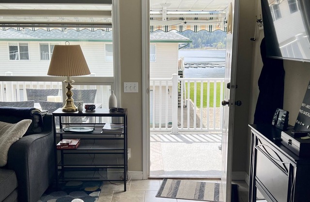 Cozy 3 bedroom townhome right on the beach with a boat slip.