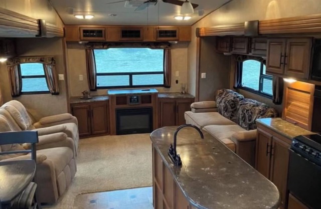 Cozy 5th wheel RV across Mille Lacs lake