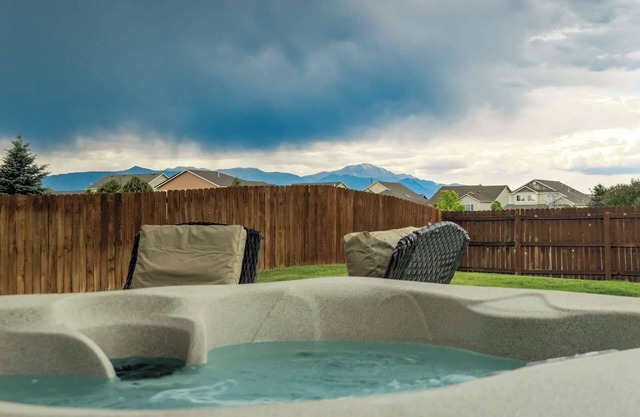 Cozy 6BR Colorado Springs Retreat w/ Hot Tub, Gym, Theater & Sunset Views!