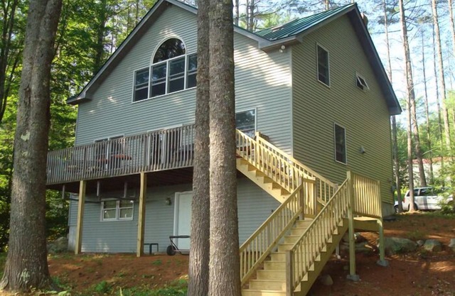Cozy and contemporary waterfront home in tranquil area on Woods Pond.