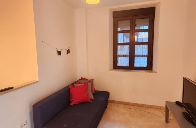 Cozy and quiet apartment in the center next to the city wall.