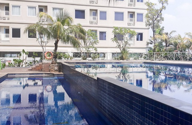 Cozy and Simply Studio Titanium Square Apartment