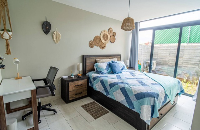 Cozy apartment with garden, fast WiFi sofa bed and space for 3 comfortable people