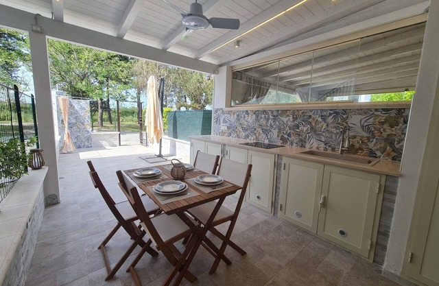 Cozy beach house 150 mt from the beach kitchen and shower also outside