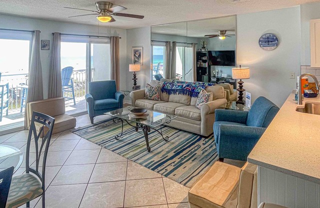 Cozy beachfront condo with private balcony, shared pool & beach access