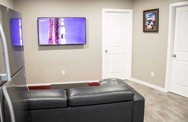 COSY BRAND NEW LEGAL SUIT IN LIVINGSTON CALGARY