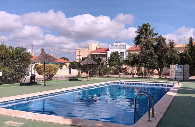 Cozy bungalow-access to community pool. La Marina beach 3km away