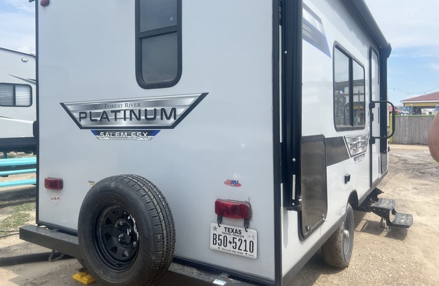 Cozy camper with full hookups, free parking, and free Wifi!