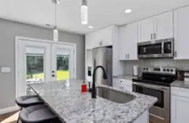 Cozy Centrally Located 4-Bedroom 4-Bath Home