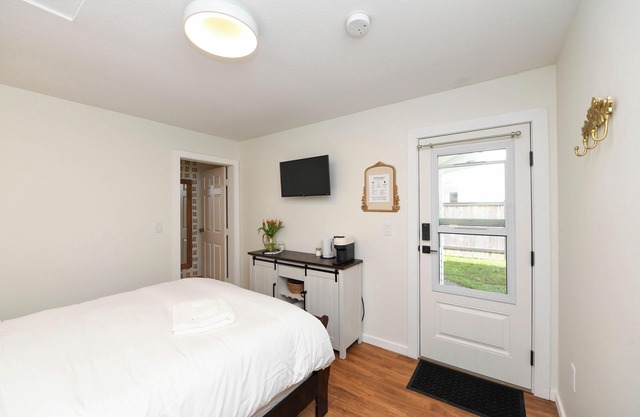 Cozy hotel like bedroom suite with fridge, microwave, coffee and full piece bath
