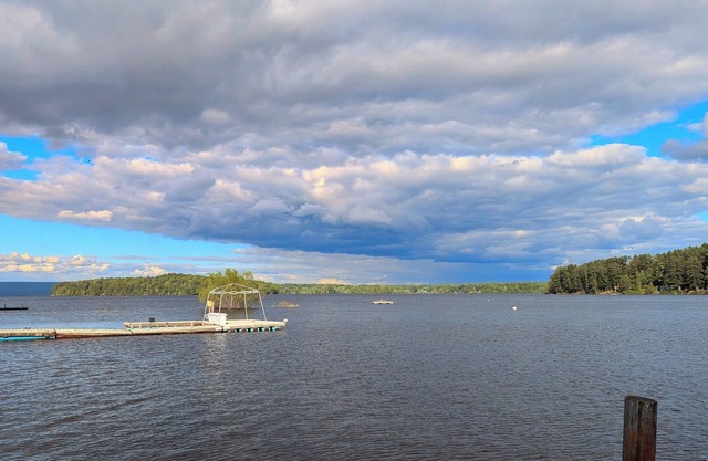 Cozy lake view home, centrally located with lake access and private dock!