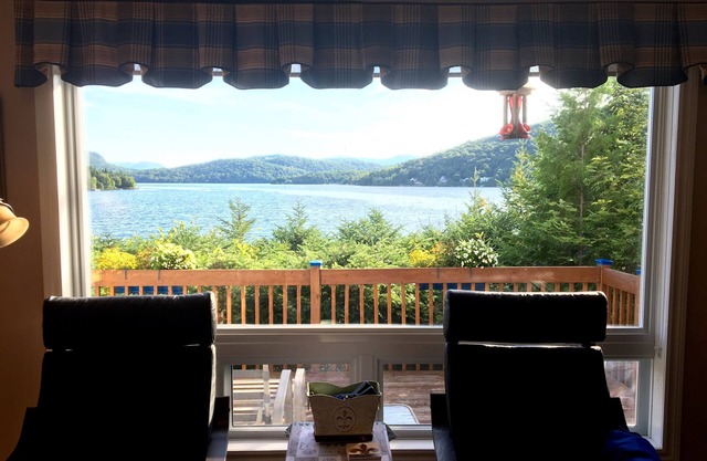 Gemütliches Ferienhaus am See mit atemberaubendem Blick auf See und Berge