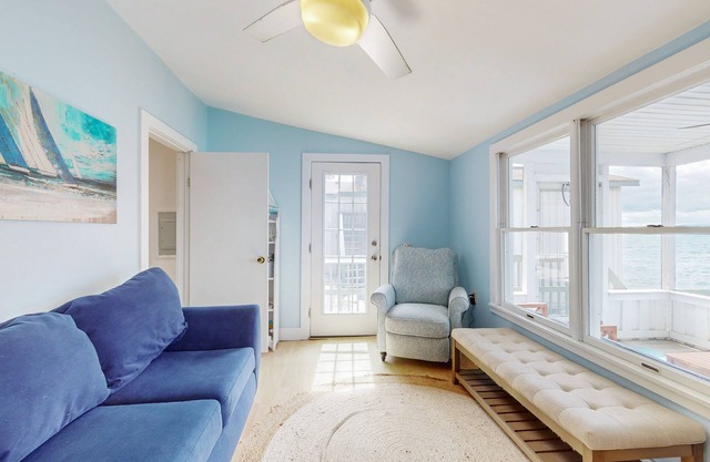 Cozy lakeside escape with screened porch, deck, pets, & AC