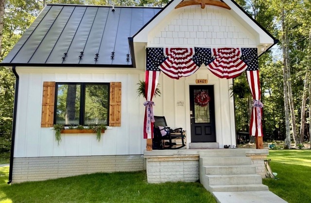 Cozy modern cottage on over 250 acres with 3/4 mile of Hazel river frontage!