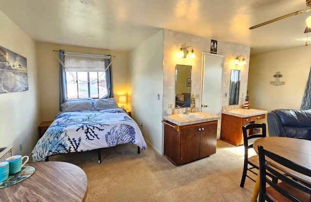 Cozy nautical-themed studio with private entrance
