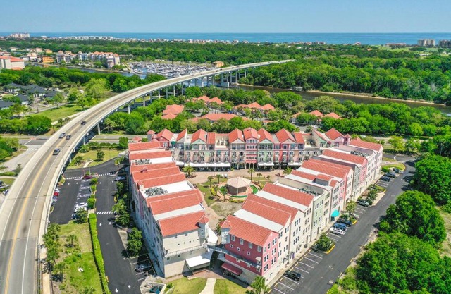Cozy Queen Suite in European Village with Balcony view near beaches