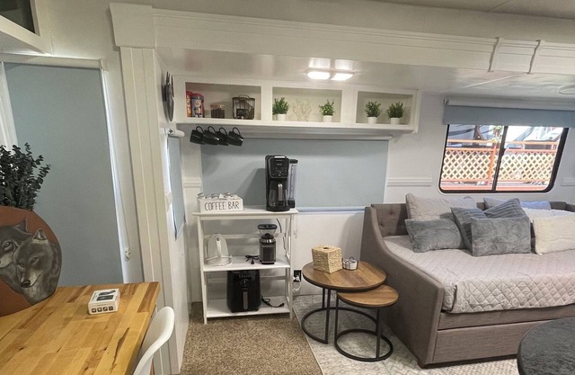 Cozy RV on working farm. 1 bedroom with queen size bed, 2 twin size beds.